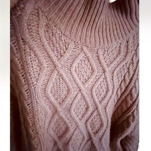 Soft cozy mauve pink sweater. Not itchy and keeps you warm.